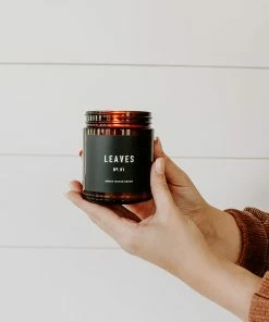 Sweet Water Decor Leaves Soy Candle - Amber Jar - 9 Oz
