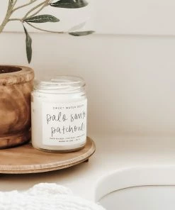 Sweet Water Decor Palo Santo Patchouli Soy Candle - Clear Jar - 9 Oz
