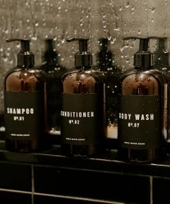 Sweet Water Decor 16oz Amber Plastic Bath + Shower Dispenser Set Of 3 - Black Label SOAP DISPENSERS