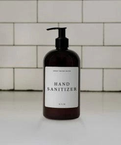Sweet Water Decor 16oz Amber Plastic Hand Sanitizer Dispenser - White Text Label SOAP DISPENSERS