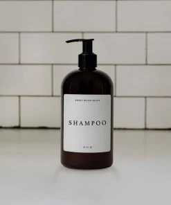 Sweet Water Decor 16oz Amber Plastic Shampoo Dispenser - White Text Label