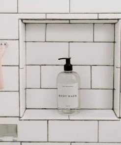 Sweet Water Decor 16oz Clear Plastic Body Wash Dispenser - White Text Label