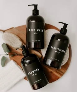 Sweet Water Decor 16oz Amber Plastic Bath + Shower Dispenser Set Of 3 - Black Label SOAP DISPENSERS