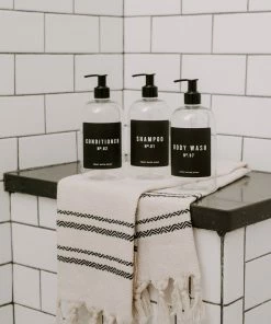 Sweet Water Decor 16oz Clear Plastic Body Wash Dispenser - Black Label SOAP DISPENSERS