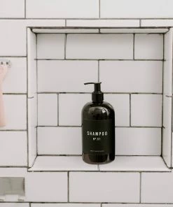 Sweet Water Decor 16oz Amber Plastic Shampoo Dispenser - Black Label